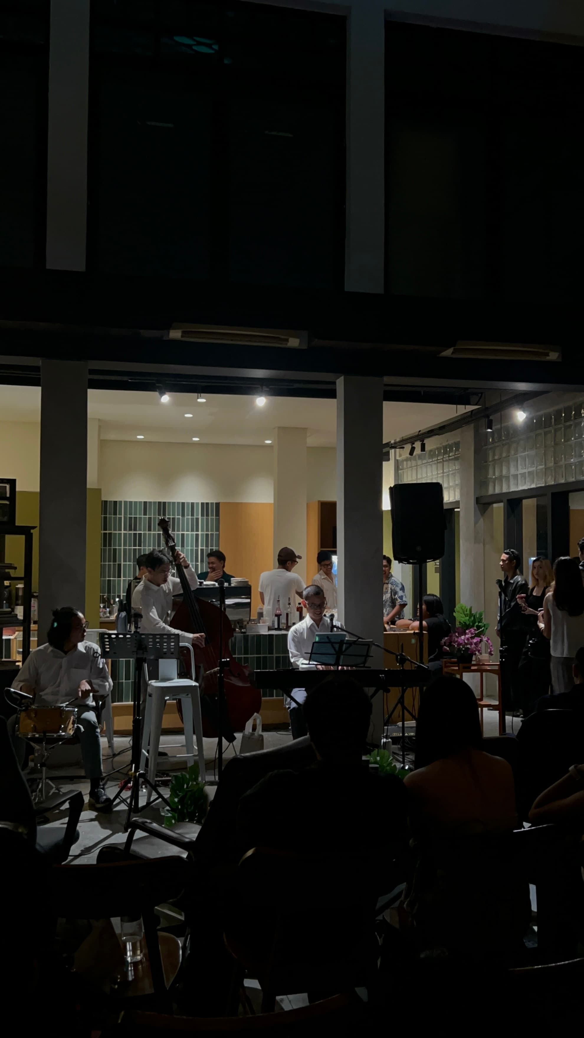 An intimate view of the musicians and guests during the first Saudade House 52 gathering.